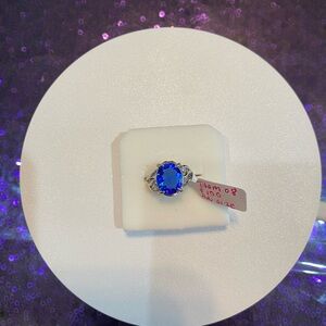 Blue topaz 10 x 12 mm oval ring. Item 8. Very beautiful!!!